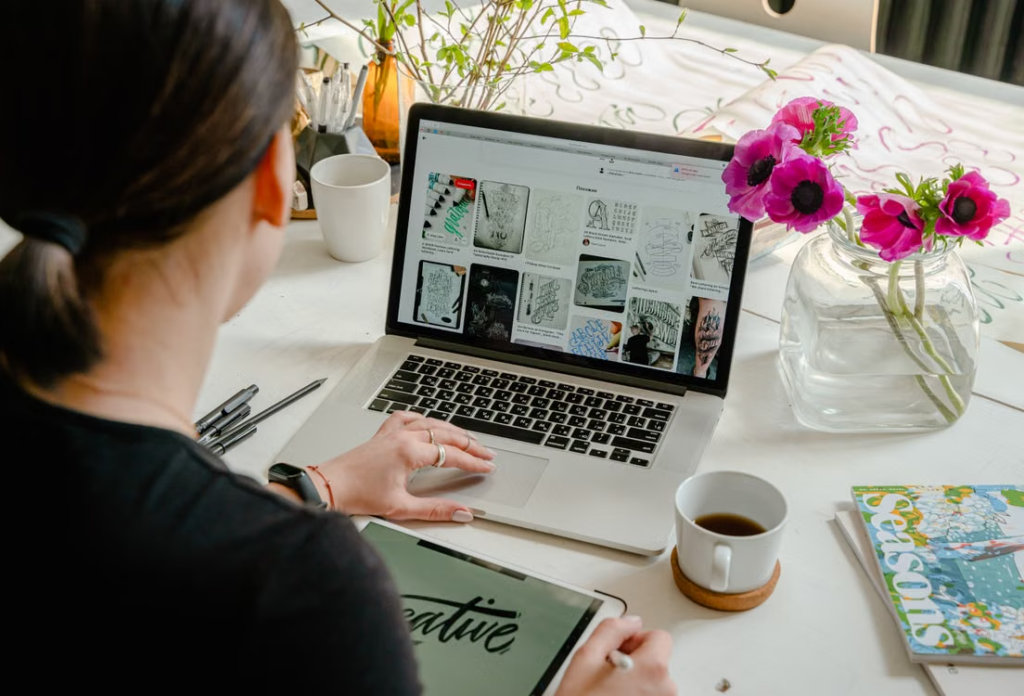 Designer creating original artwork for a licensed collaboration project.